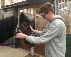 Pacific NW Horse and Dog Therapy Lucas with horse_web